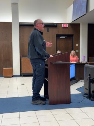 Bryan Dozier, with REACT, spoke the the Shawnee City Commission about REACT's 30th Anniversary this week. Julie Talton, Countywide &amp; Sun