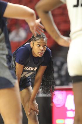 Shawnee junior JaNya Bruner takes a minute to visualize before taking her foul shots during the Class 5A State Quarterfinal game against Del City, held at the Lloyd Noble Center in Norman on March 12.