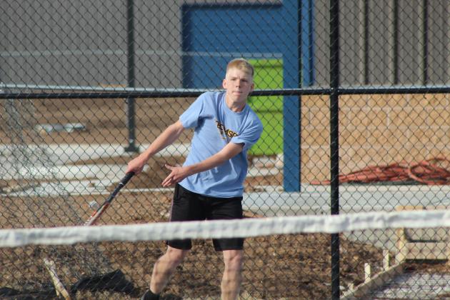 Tecumseh sophomore Jaxon McCullough keeps his eye on the ball during the Tennis Scrimmage at Shawnee's newly completed facility on Feb. 24. THS opened their tennis season on Feb. 26 against Choctaw at home, and SHS also faced Choctaw at home for their first official match on Feb. 27.