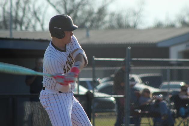 Tecumseh sophomore Cooper Laughlin takes a swing during the home game against Chickasha on March 9. The Savages lost 0-11. Tecumseh photos by Natasha Dunagan, Countywide &amp; Sun