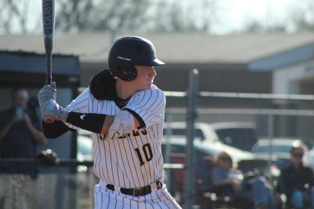 Tecumseh junior Wyatt Dodgion concentrates on the pitch during the home game against Chickasha on March 9.
