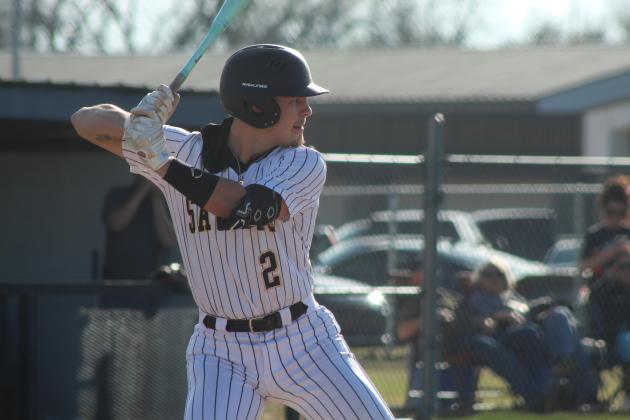 Tecumseh junior Kruz Shirey prepares to hit a single during the home game against Chickasha on March 9.