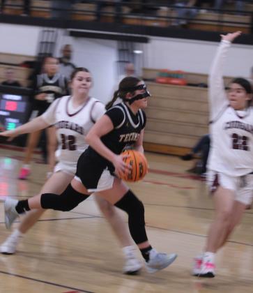 Tecumseh senior Cadence Leba drives toward the basket in the third quarter of the Class 4A Regional Consolation Bracket game against Ada, held at McLoud on Feb. 26. The Lady Savages lost, 32-42, ending their season.