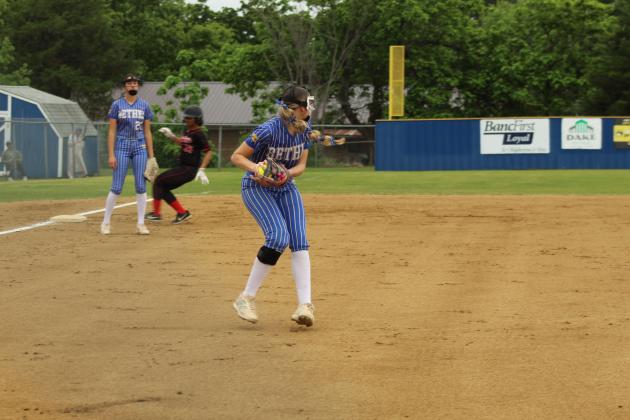 Bethel pitcher, junior Kinley Anthony throws to second base to tag a runner during the home game on April 23.