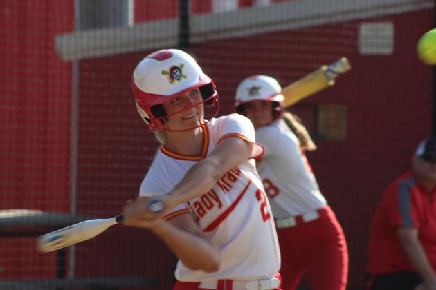 Dale junior Kinley Patten hits a double in the sixth inning of the March 30 home game against Washington. The Lady Pirates beat the Lady Warriors, 19-14, and they stomped Lexington, 15-0, on the same day.