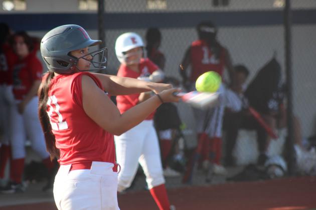Earlsboro sophomore Avaleigh Fields makes contact while at bat during the April 2 game against Macomb played at the BCM Sports Complex in Seminole.