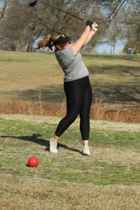Tecumseh senior Kyrie Aultman drives to the fairway during the North Canadian River Valley Conference Tournament, held at the Elks Golf Course on March 24. In addition to the Lady Savages, Tecumseh also brought two boys teams. North Rock Creek, Bethel and McLoud also participated in the event.