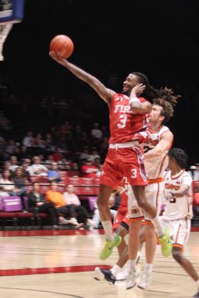 Potawatomi Fire forward Ricky Artis II showcases his trademark style while sinking a bucket during the April 3 home game against the Dallas Stampede..