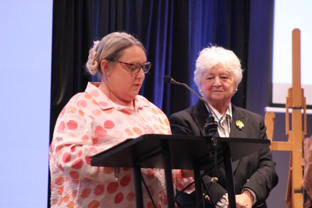 Shelly Welch speaks, as Marilyn Bradford listens.