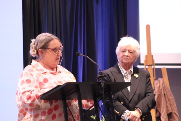 Shelly Welch speaks, as Marilyn Bradford listens.