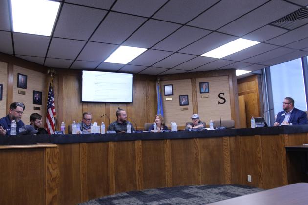 The Shawnee Board of Education and Superintendent Dr. Jason James meet on April 13. Shown, from left, are Clif Harden, Casey White, Russ Oliver, Turner Bass, Jeanne Swinney, Mandy Hillhouse and James.