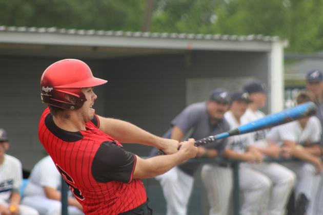 Macomb sophomore Korbin Whelpley-Hoff makes contact at bat during the first inning of the Class B District Baseball Tournament at Asher on April 22.