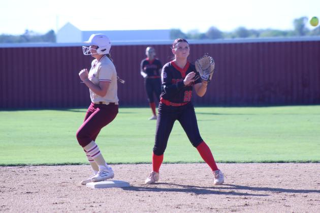 McLoud junior Miley Hicklin waits for the catch at second base during the April 6 game against Byng at Dale. In the triple-header, the Lady Redskins lost to both Lady Pirates teams: Byng, 0-6, and Dale, 6-16. The Dale Lady Pirates beat Byng, 15-6.