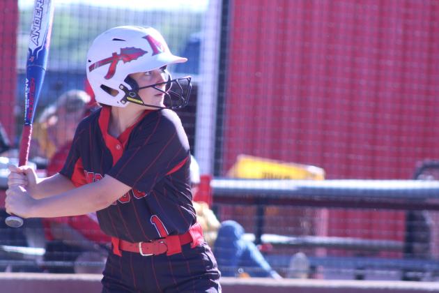 McLoud freshman Kayleigh Smith keeps her eyes on the ball before hitting a single during the April 6 game against Byng at Dale. In the triple-header, the Lady Redskins lost to both Lady Pirates teams: Byng, 0-6, and Dale, 6-16. The Dale Lady Pirates beat Byng, 15-6.