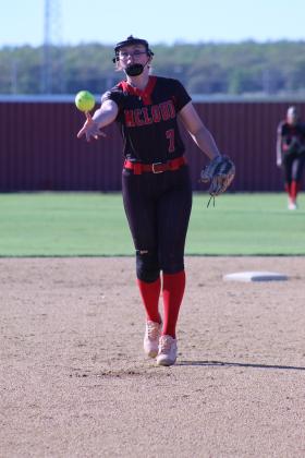 McLoud junior Avery Soward arcs the ball past the Byng batter during the April 6 game at Dale. In the triple-header, the Lady Redskins lost to both Lady Pirates teams: Byng, 0-6, and Dale, 6-16. The Dale Lady Pirates beat Byng, 15-6.