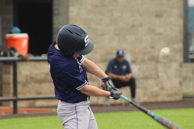 Shawnee freshman Laykn Grasty gets his turn at bat during the Alumni Game on April 25.
