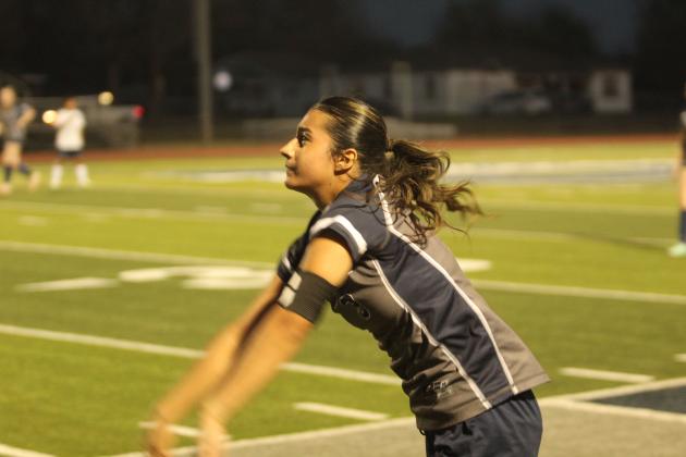 Shawnee Soccer Captain Sadie Garcia throws in the ball during the March 24 home game against Putnam City West.  Natasha Dunagan, Countywide &amp; Sun