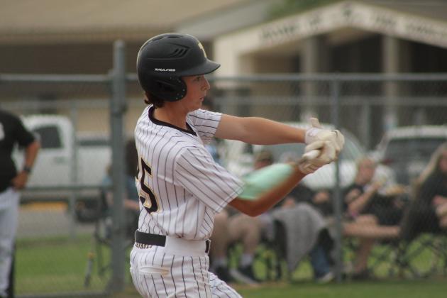 Tecumseh freshman Colby Wilson smacks a single during the April 3 home game against Bethel. The Savages beat the Wildcats, 9-6.