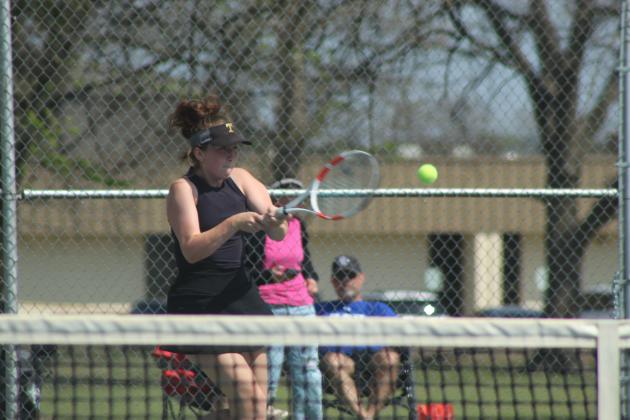 On #2 Singles, Kylie Britt keeps the ball in play during the Tecumseh Tennis Tournament on March 30. Britt placed fifth in the tournament. Photos by Natasha Dunagan, Countywide &amp; Sun