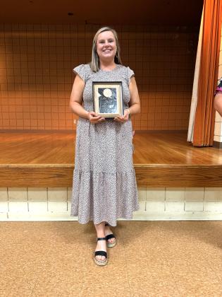 Katie Marrs, Lola C. Durham Award Principal Drew says, "She's always busy, always doing something, and we're so very proud. I asked the kids about Katie. I said, ‘talk to me and tell me about Miss Marrs. And what is it about her classroom that you love?’ And here were some of the comments that they said: they said ‘she makes math fun.’ Another student said 'she's really cool.’ Another student said ‘she loves us.’ That one, you know, that's what it's all about, isn't it, for kids to love school.