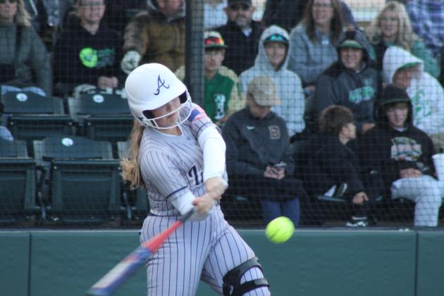 Asher sophomore Nevaeh Griffin hits a single during the fourth inning of the Class B Slow Pitch State Championship game against Leedey, held at FireLake Ball Fields on May 6.