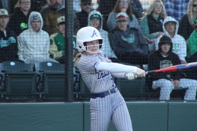 Asher junior Makaylee Harrell hits a home run during the fifth inning of the Class B Slow Pitch State Championship game against Leedey, held at FireLake Ball Fields on May 6.