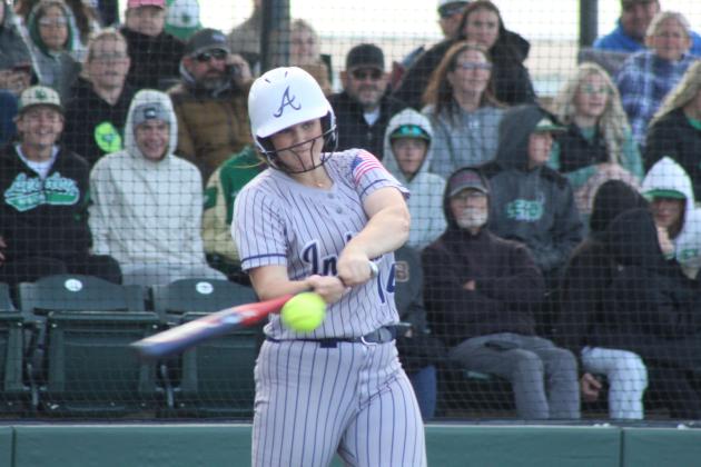 Asher freshman Karley King hits a single during the third inning of the Class B Slow Pitch State Championship game against Leedey, held at FireLake Ball Fields on May 6.