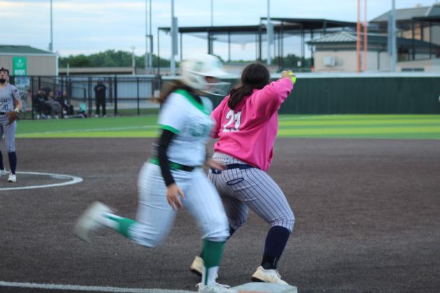 Asher sophomore Raina Timms makes the catch at first base during the fourth inning of the Class B Slow Pitch State Championship game against Leedey, held at FireLake Ball Fields on May 6.
