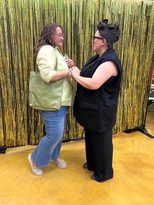 Renee Clemmons received the prize for best model from judge Sylwia Partyka at the Second Annual Rags 2 Runway event held at spOKeLAHOMA on April 25. The event raised over $1000 for Project:SAFE.