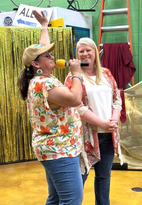 Project:SAFE director Renee Clemmons introduced the audience to Sandy Vanderburg at the Second Annual Rags 2 Runway event held at spOKeLAHOMA on April 25. The event raised over $1000 for Project:SAFE.