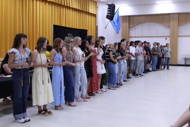The senior student athletes pose with their plaques and, for the first time, graduation cords during the Tecumseh HIgh School Athletic Awards on May 18.