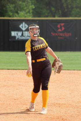 Tecumseh junior Abbi Jordan sends her slow pitch home during the Class 5A Slow Pitch Regional Tournament home game against McLoud on April 29.