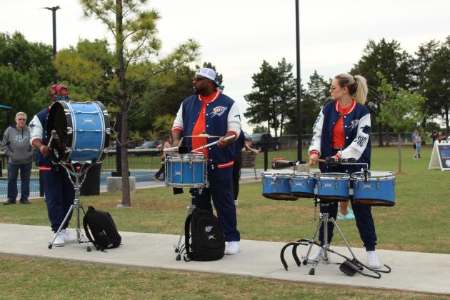 Thunder drummers, Kacy Harvey, Jaylen Mustin and Shea Cokeley, perform during the Thunder Up Tour at KidSpace Park on April 30.