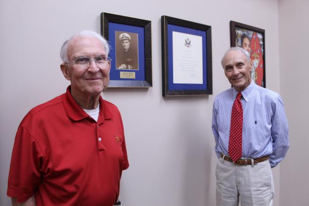 Veterans and brothers Bill Ford and Bob Ford pose with a photo of Bill's late father-in-law, William H. Mendenhall, and a letter from President Truman to Nancy Ford in the Gold Star Families Room at the Pott. Co. Veterans Educational Museum.
