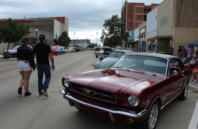 A 1965 Ford Mustang belonging to Johnny Abney of Shawnee was one of several vehicles at "Rides and Rods" on June 18 in Downtown Shawnee. According to the "Rides &amp; Rods Shawnee Oklahoma" Facebook page, there were about 20 to 30 hotrods on Main Street and lots of motorcyles along Bell Avenue. This event happens on the third Thursday each month, April through October.