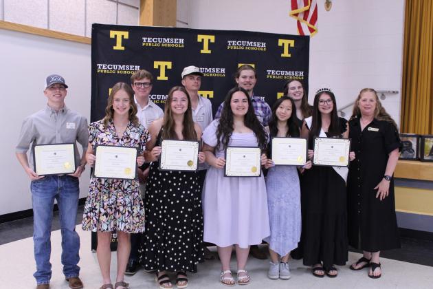 Ten 2026 Tecumseh High School graduates received $1,000 Alumni Scholarships at the 124th Annual Tecumseh Alumni Banquet, held at the WP Wood THS Alumni Center on May 30. There were 17 applicants this year, and all 17 would have been awarded scholarships, had they been present. Shown, front row, are Blake Wright, Addison Taron, Maggie Wilson, Cheyanna Dietz, Kelsy Nguyen, Avery Renken, Alumni Immediate Past Pres. Kacy Kinsey, back row, Blake Sampson, Landyn Seaton, Ryan Batterton &amp; Adalaide Lack.