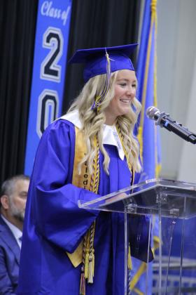 Bethel Co-Valedictorian Payton Epperley addresses her fellow graduates at Bethel High School's Commencement Exercises on May 16. Epperley spoke about having major hip surgery in her senior year and losing her father when she was five. "When everything is stripped away, when the plans pause, when the titles don't apply, when life is hard, you realize how much of your identity you've tied to things that can be taken from you, and you're left with one question, 'Who am I without all of that?' " said Epperley.
