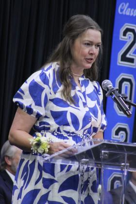 Bethel High School Science Teacher and Bus Driver Amanda Brock gives the address during graduation, held at the BHS gym on May 16. "This particular group of students just really means a lot to me and holds a special place in my heart," she said. Then, she reminded the graduates what she always says: "You're good enough, you're smart enough, you can do this," and she elaborated on why she says that.