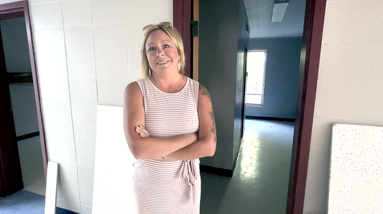 Caring Collective Director Kelley Metcalf discusses the plans while giving a tour of the work in progress - future resident area for program participants - located inside Degrasse dorms on the former St. Gregory's University campus. Suzie Campbell, Countywide &amp; Sun