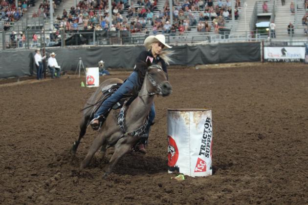Brayle Miller of McLoud competes in the barrel racing event of the International Finals Youth Rodeo (IFYR) on July 12.