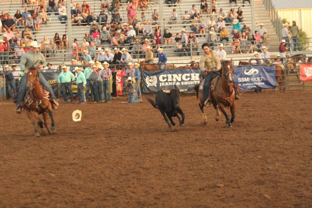 Blake Huddleston of McLoud takes his turn in the steer wrestling during the IFYR on the evening of July 16.