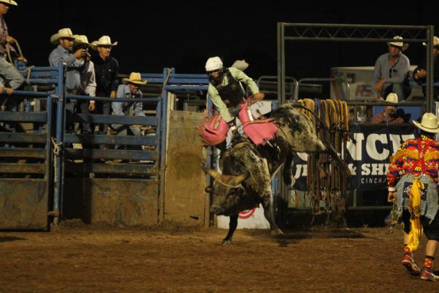 Trigger Ladd of Caney, OK, is ejected from his bull during the championship round on the evening of July 17.