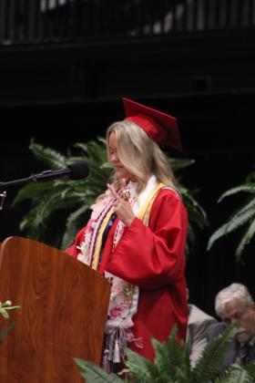 McLoud High School Valedictorian Addison Adams was the fifth of nine valedictorians and one salutatorian to speak at the MHS Graduation Ceremony on May 23 at FireLake Arena. Adams spoke about the Lady Redskins wrestling team winning the state tournament for the second year and her personal challenges as a wrestler. "This wasn't just about earning the trophy," she said. "It was about proving what we're capable of when we believe in ourselves and one another." Fellow wrestler Launa Troutt spoke, too.