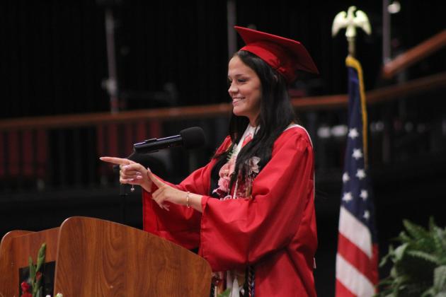 McLoud High School Valedictorian Jordyn Dennis was the fourth of nine valedictorians to address her fellow grads during graduation on May 23 at FireLake Arena. She gave a humorous speech, pointing out how they relied on technology during the Covid pandemic, only to have their phones banned in their senior year, and how they would "nod and hope" to understand concepts in class. "There are two and a half things that you must remember," she said. "The first thing is everyone must die. Bad, sorry, I know. The s