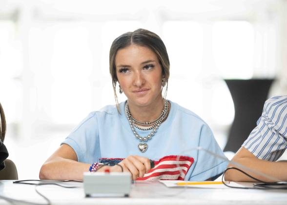 Madalyn Taron works on her Quiz Bowl test. Photo provided.