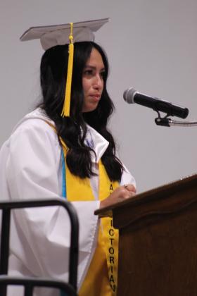 Maud Valedictorian Abigail Horton addresses her class during Maud High School's Graduation on May 22 at the Ed Harman Gymnasium. Horton spoke about having a rough year and how she pulled through with the help of family and friends. "It's easy to look around and feel like everyone else has everything figured out, but the truth is, most of us were just doing our best behind the scenes, and that was enough," she said.