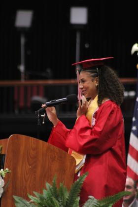 McLoud High School Valedictorian Taycee Lewis was the sixth of nine valedictorians and one salutatorian to speak during graduation on May 23 at FireLake Arena.