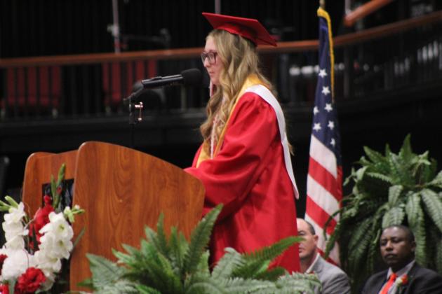 McLoud High School Valedictorian Lydia Reece was the third of nine valedictorians to address her fellow grads during graduation on May 23 at FireLake Arena.