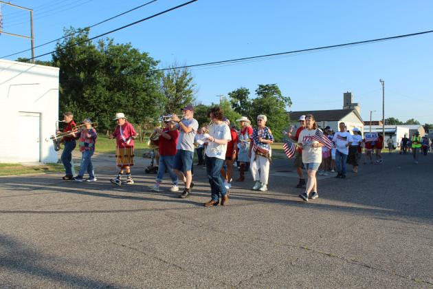 In celebration of the 250th USA anniversary, the Shawnee Independence Day Parade is led by the Oklahoma Jazz Preserve south on Minnesota Ave. on their way to Main Street from the Pottawatomie County Museum on July 4. After the band performed "Taps" and the "Star Spangled Banner" in front of the museum, the parade began at 7:30 am. They ended at Woodland Veterans Park where there was a presentation at the pavillion.