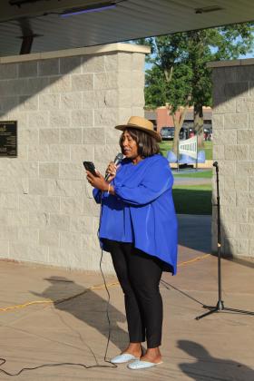 Annice Young sings the national anthem during the presentation, held after the Shawnee Independence Day Parade at Woodland Veterans Park on July 4.